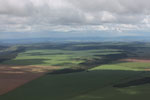Aerial view of extensive soy fields and legal forest reserves in the Brazilian Amazon