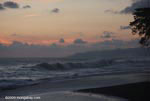 Waves breaking on an Osa Peninsula beach at sunset