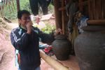 Drinking Lao fermented alcoholic beverage