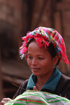 Woman weaving in a Lao village
