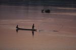 Fisherman at dawn on the Mekong