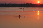 Men fishing on the Mekong at daybreak
