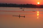 Men fishing on the Mekong at sunrise