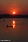 Men fishing on the Mekong at dawn