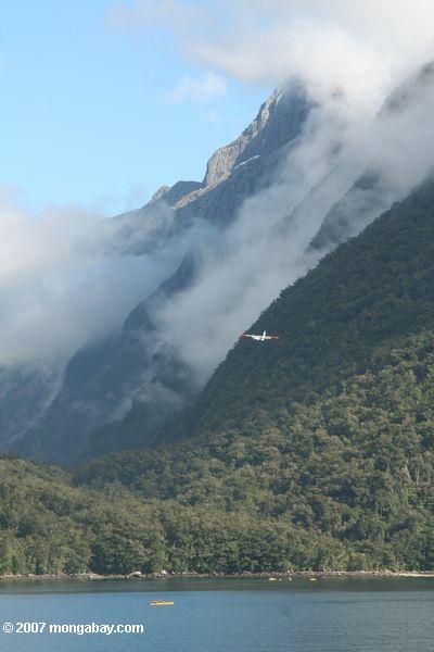 Airplane flying over Milford Sound